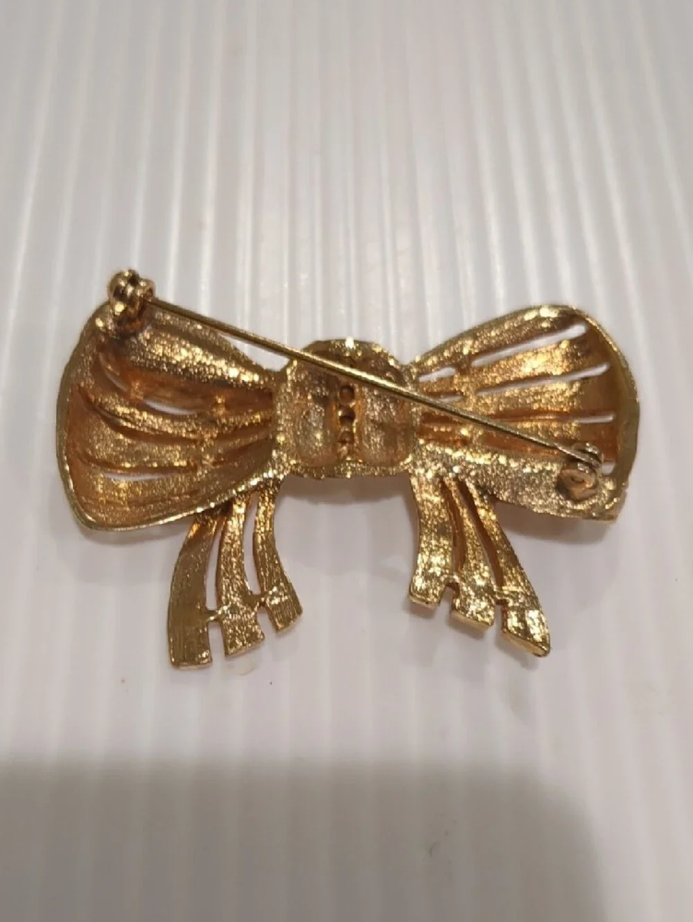 Vintage Czech gold-tone Bow Pin Brooch Clear Glass Rhinestones